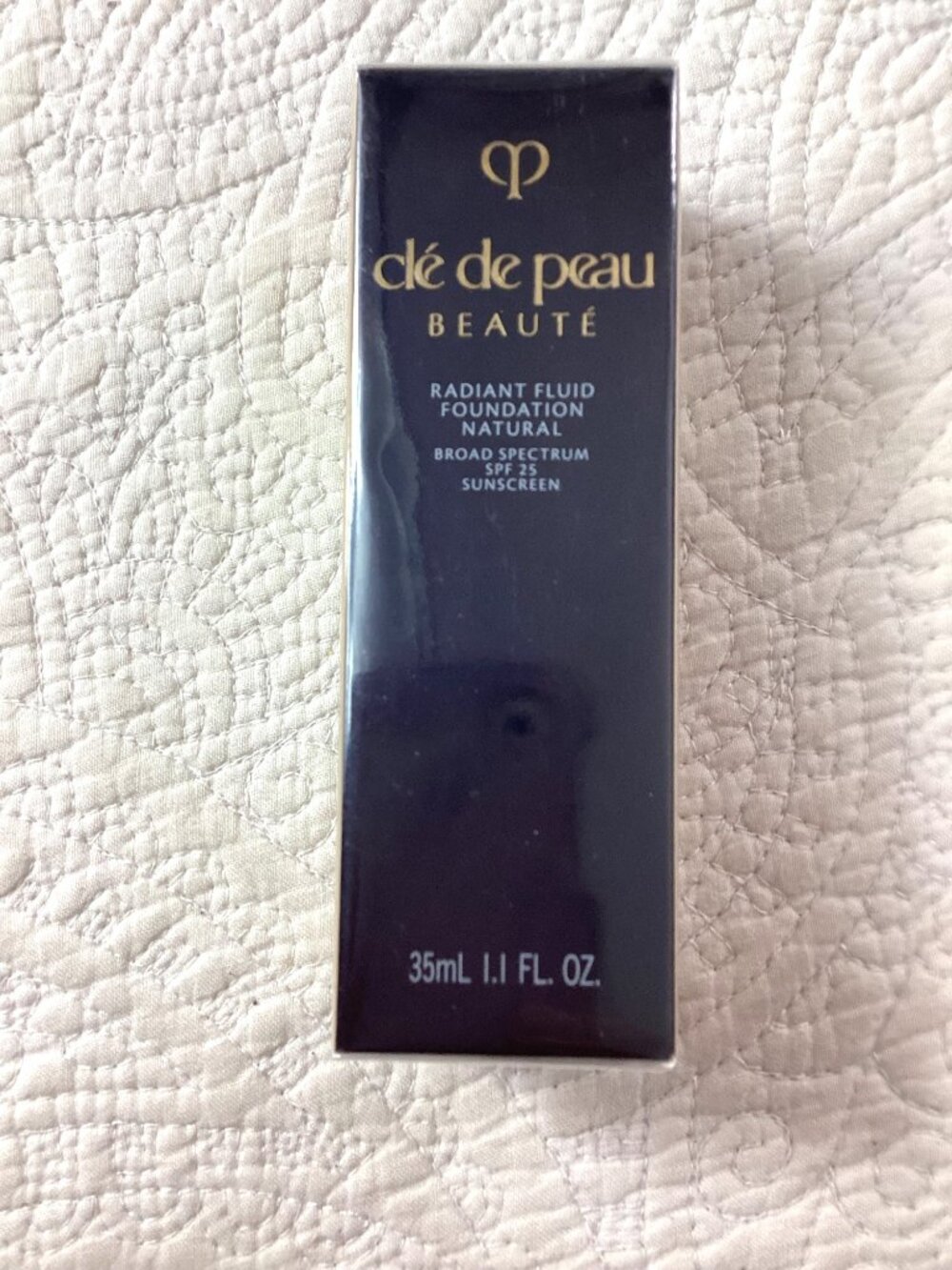Clé De Peau Beauté Radiant Fluid Foundation Natural O50 Broad Spectrum SPF 25